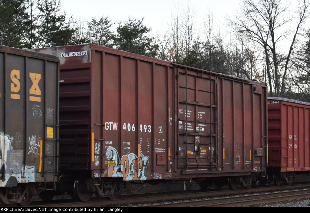 406493